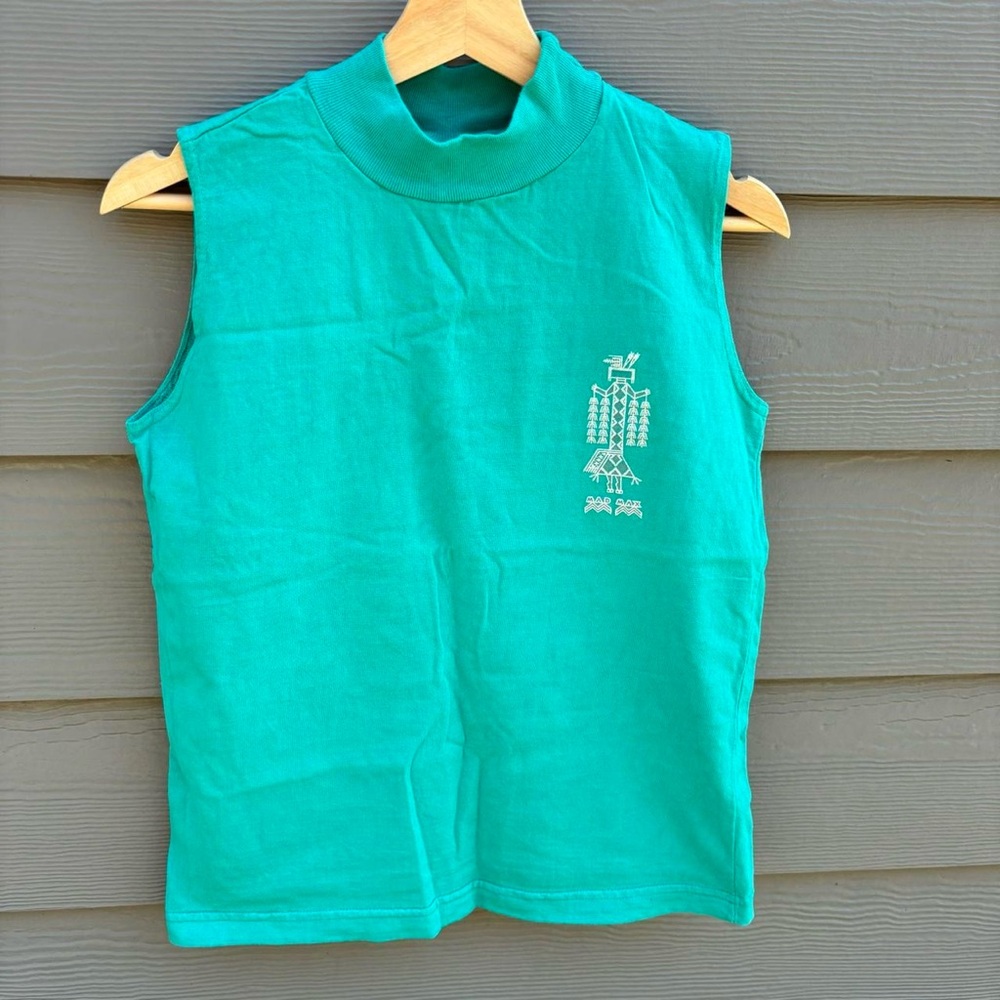 Turquoise sleeveless mad max tank